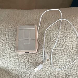 White and Pink Portable Charger with Cable
